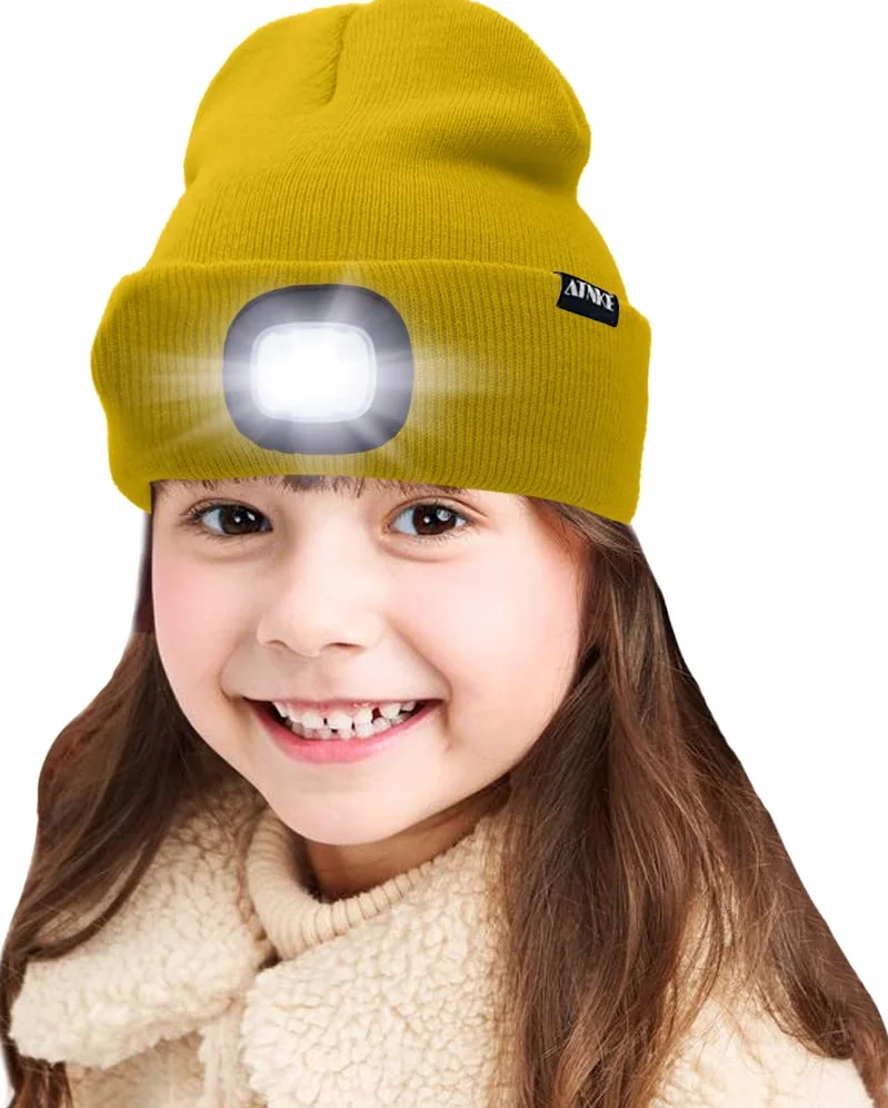 ATNKE dziecięca czapka z oświetleniem LED, ładowana przez USB, 4 reflektory LED, wodoszczelna, ocieplacz zimowy, czapka nocna z oświetleniem dla chłopców i dziewczynek, żółta